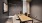 a room with a table and chairs