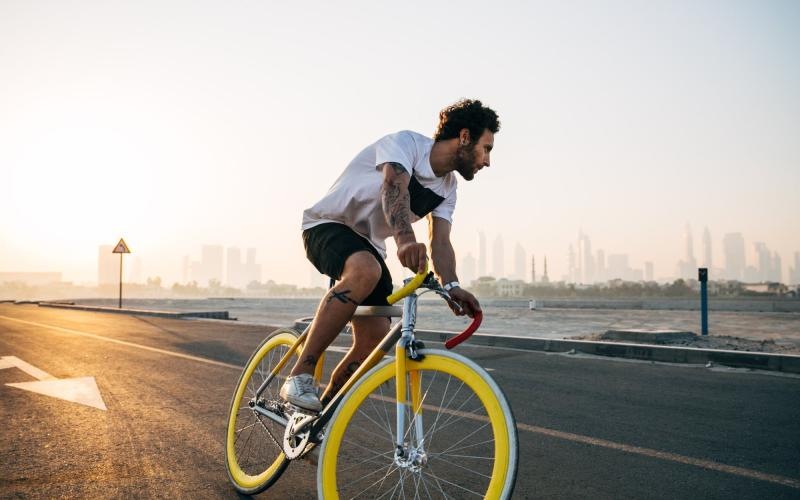 Find your perfect fit at Odin a man riding a bicycle on a road