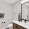 a bathroom with a large mirror
