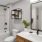 a bathroom with a tub sink and toilet
