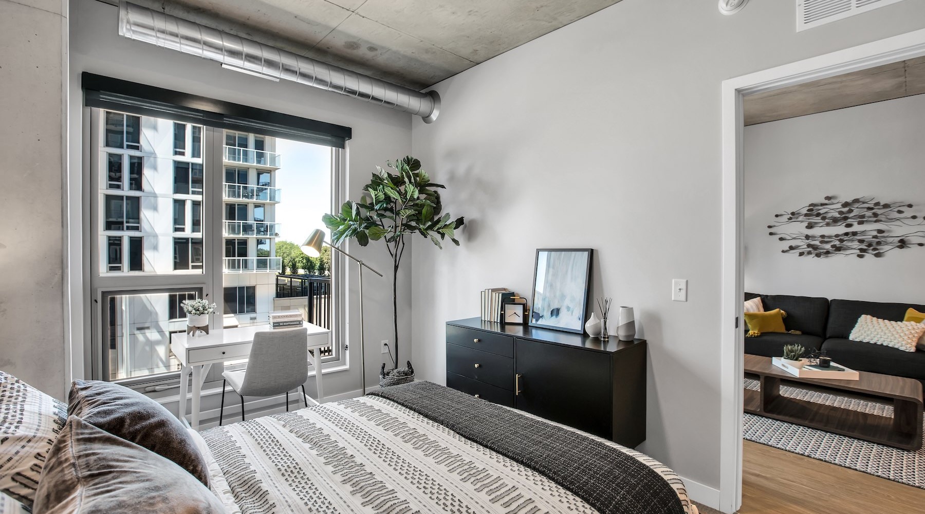 Beautiful bedrooms to fit every need a bedroom with a bed and a chair