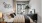 a bedroom with a bed and a plant