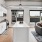 a kitchen with a couch and a table
