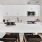 a kitchen with white cabinets