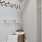 a bathroom with a toilet and shower