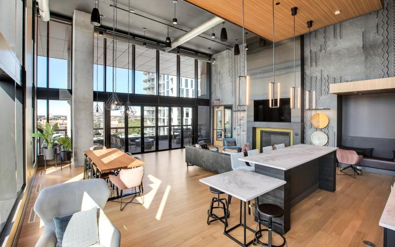 The essence of exceptional living a room with tables and chairs